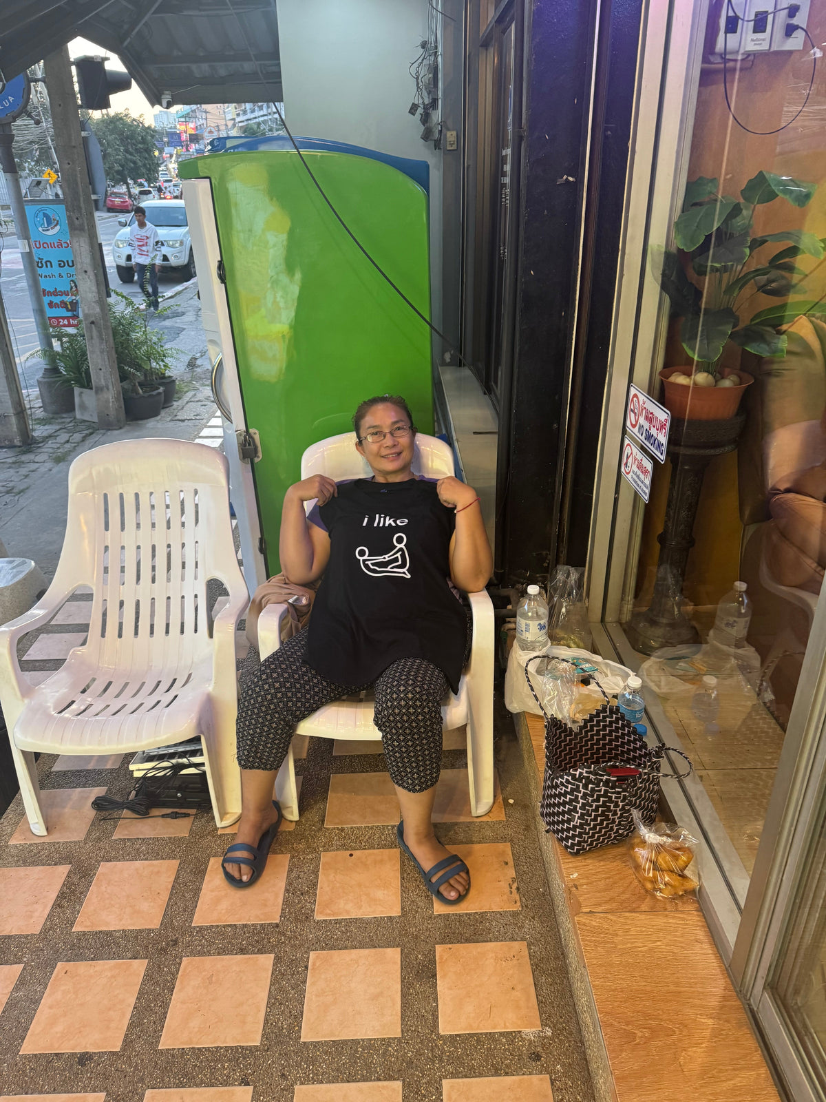 Customer wearing the I Like Massages tee